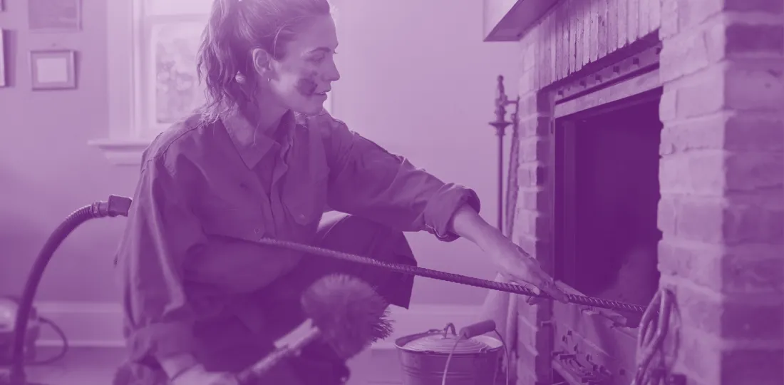 Chimney sweep inspecting flue ducts