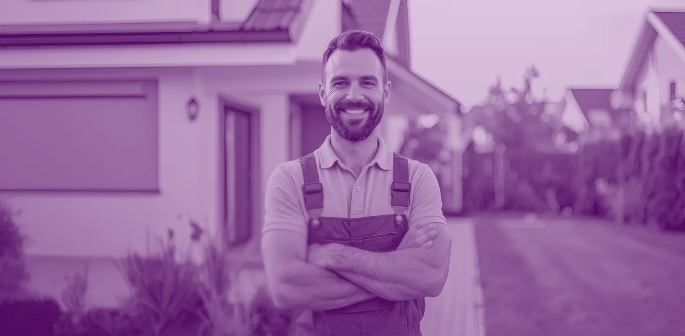Installer fitting a window at a client's property