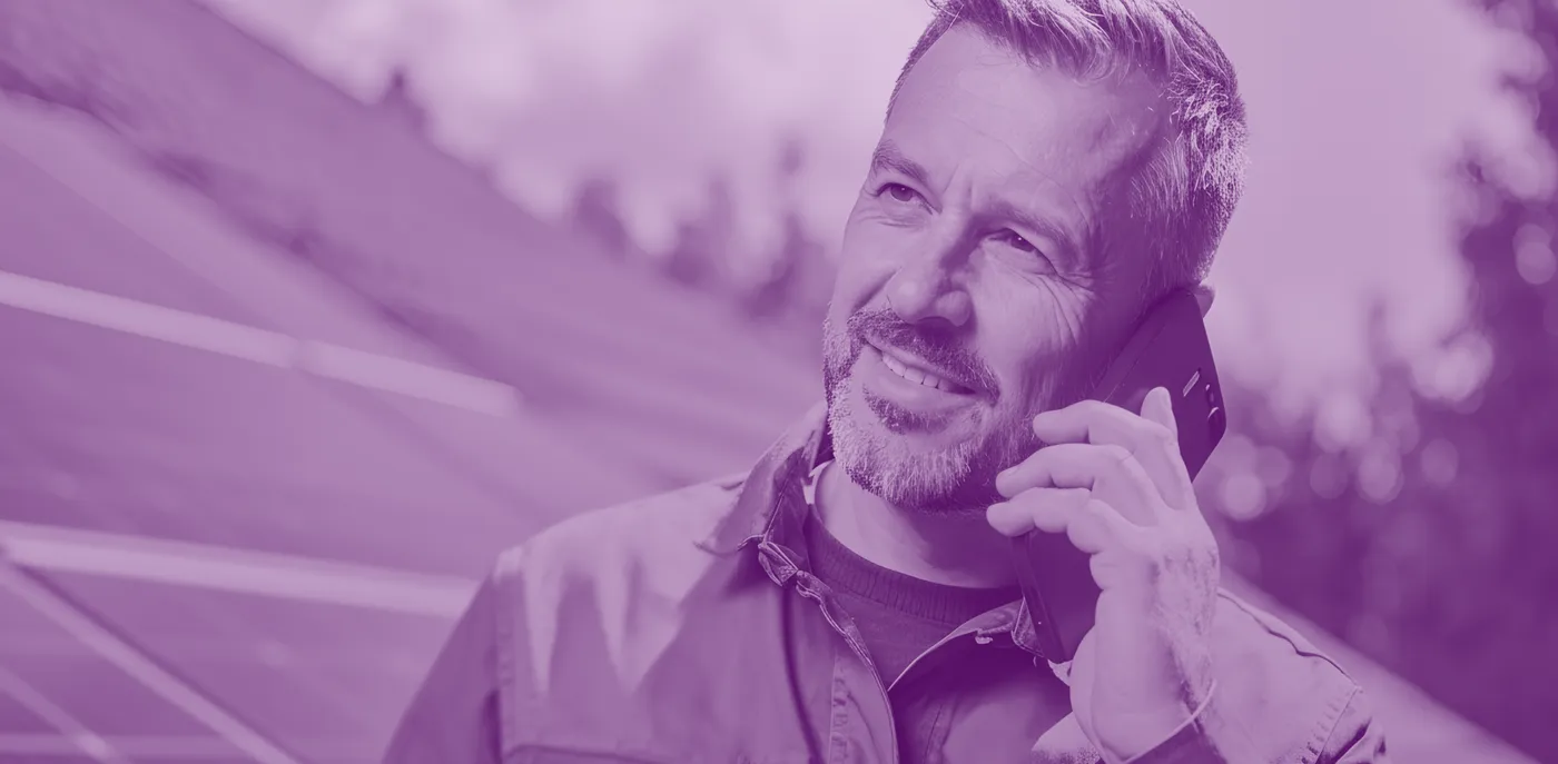 Solar panel installer working on a rooftop installation